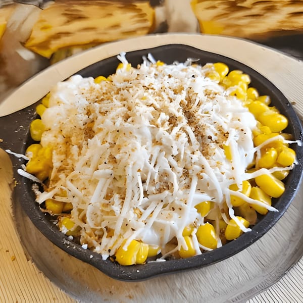El Mezcal Grill's esquites, a Mexican street corn salad with mayonnaise, cheese, and chili powder.